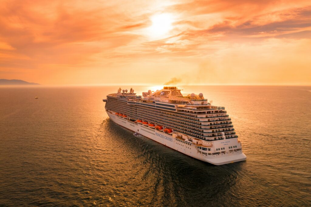Cruise ship sailing into the sunset