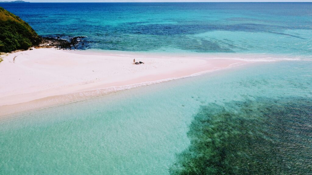 Sandy white beaches and crystal clear waters in Fiji