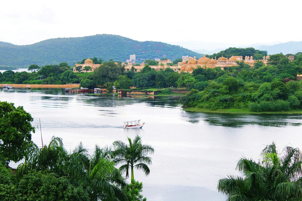 Boat on a lake near a city in India