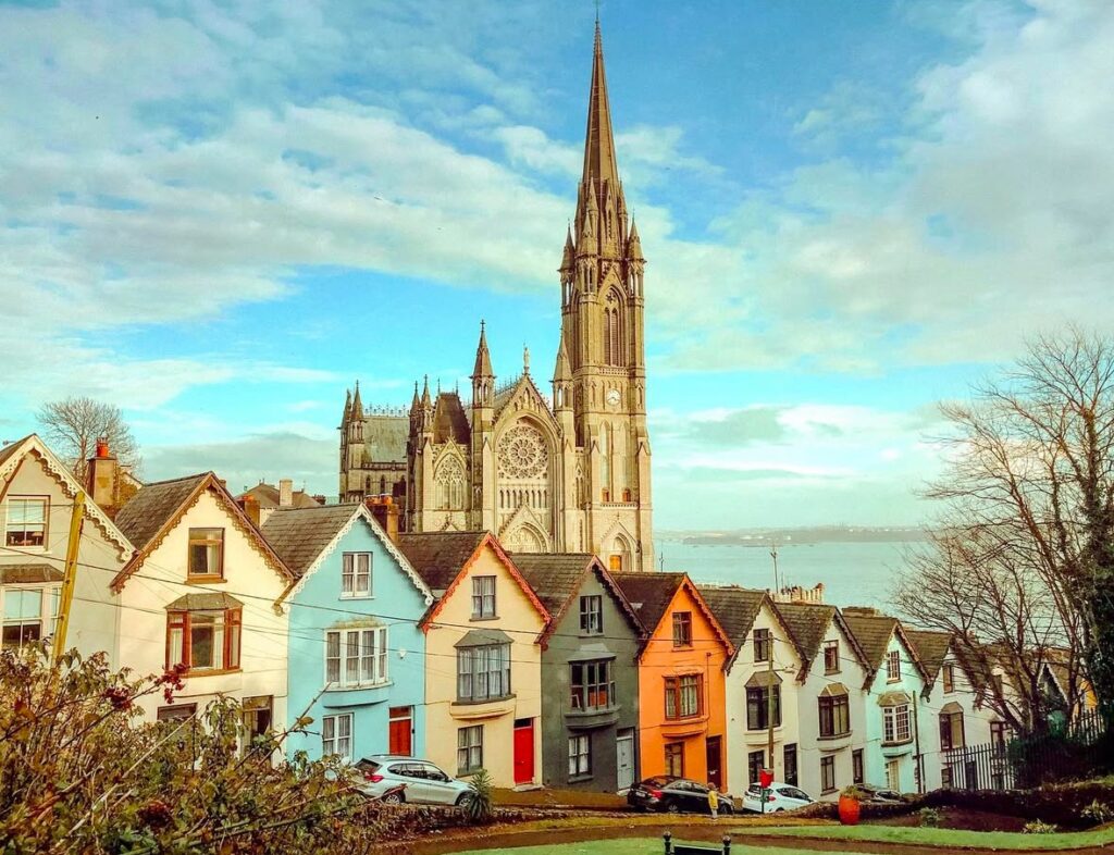 View of the deck of cards houses and St. Colman's Cathedral in Cobh, Cork, Ireland