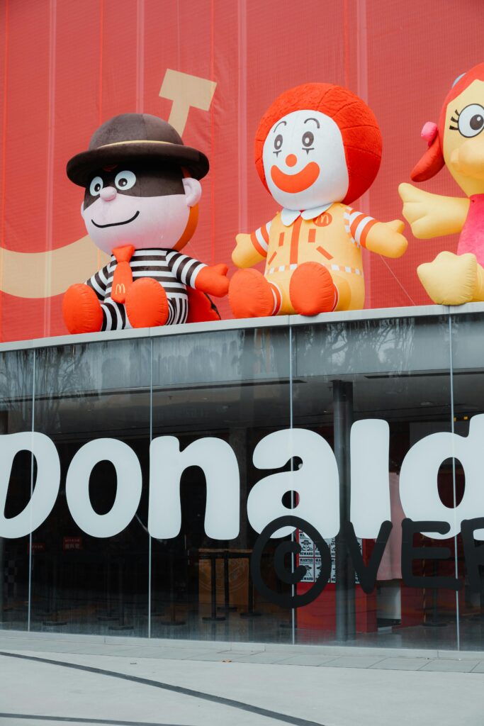 Entrance to fast food restaurant with inflatables over the door
