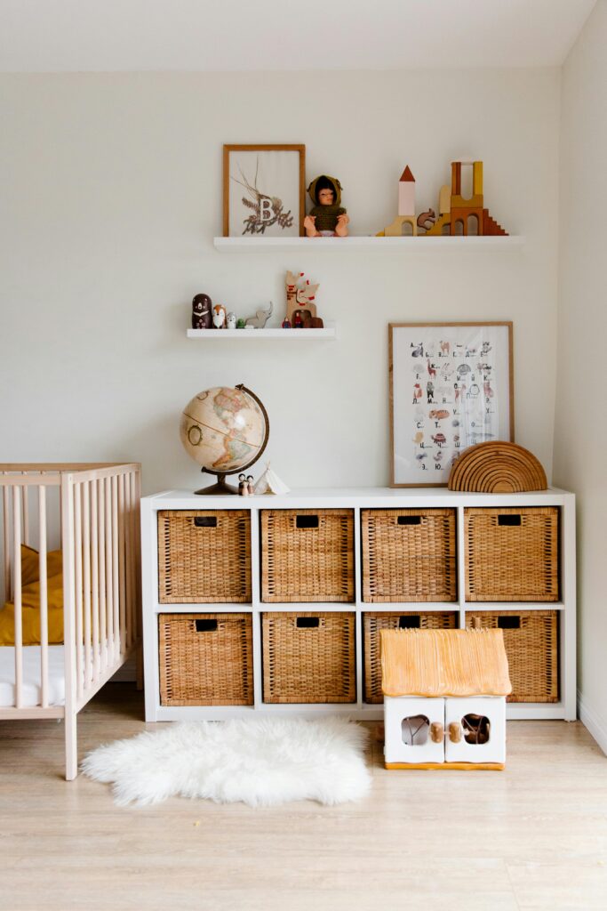 Interior of child's bedroom with wooden furniture and toys
