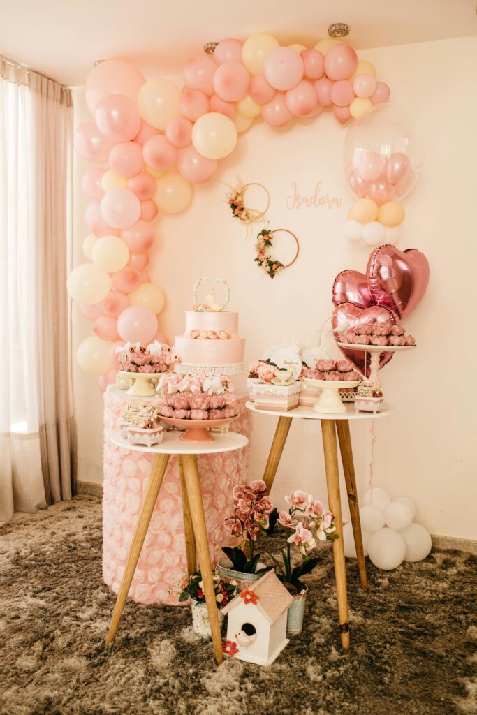 Cake and balloon arch