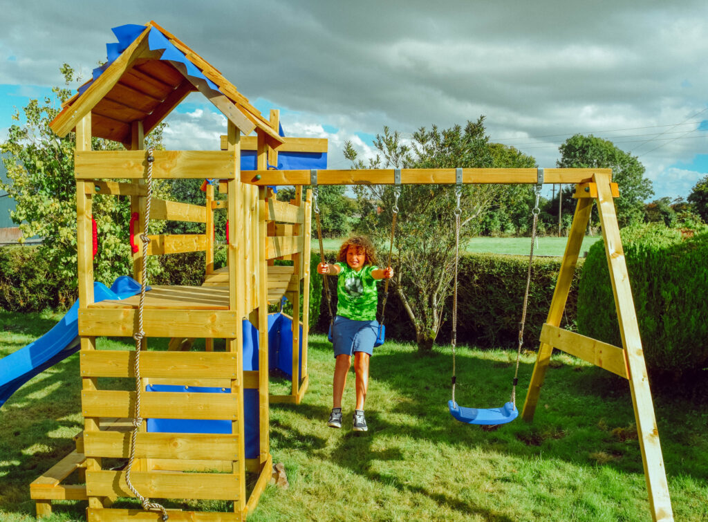 Child swinging on a swing set