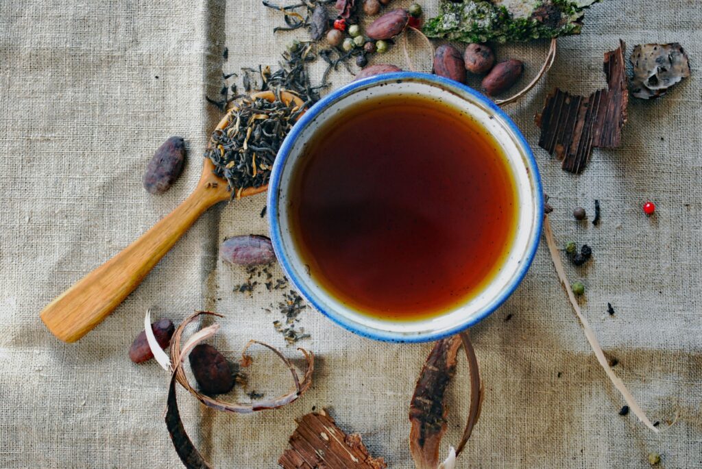 Mug with tea and a spoon