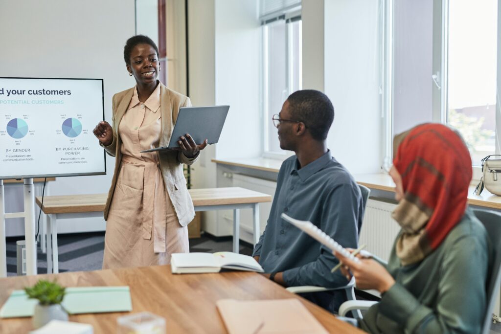 Woman giving a presentation at a business meeting