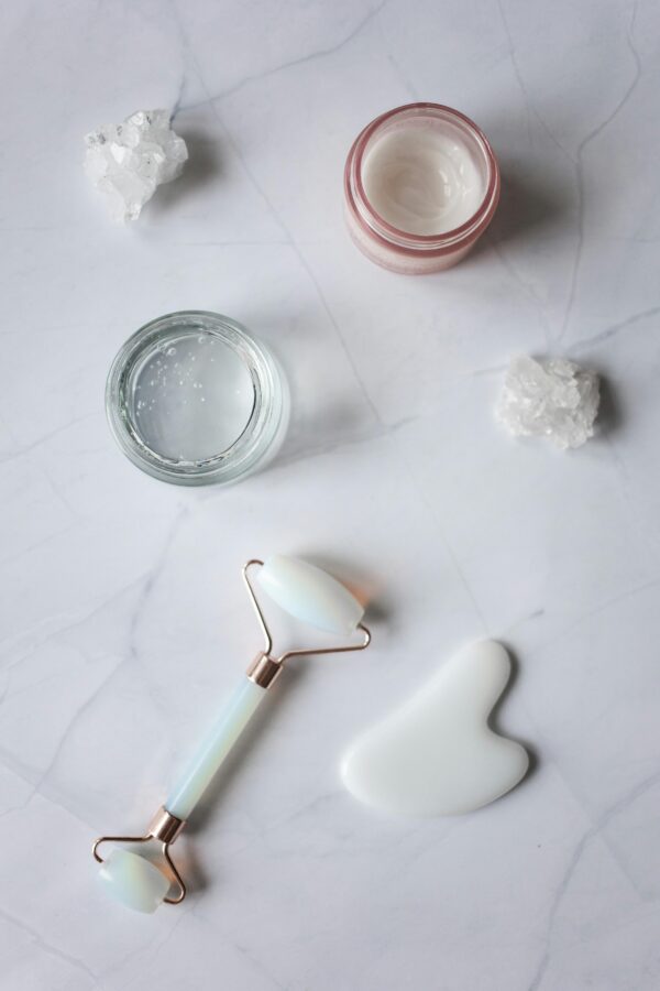 Gua sha and roller with skincare