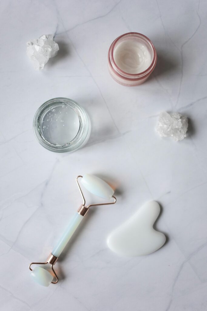 Gua sha and roller with skincare
