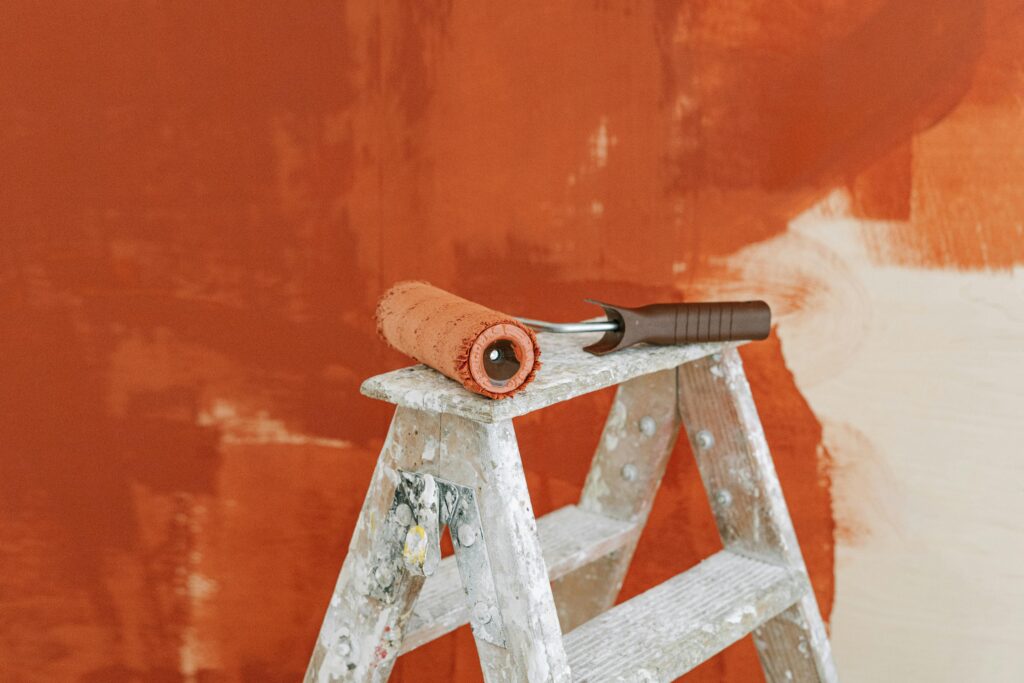 Paint roller on a ladder