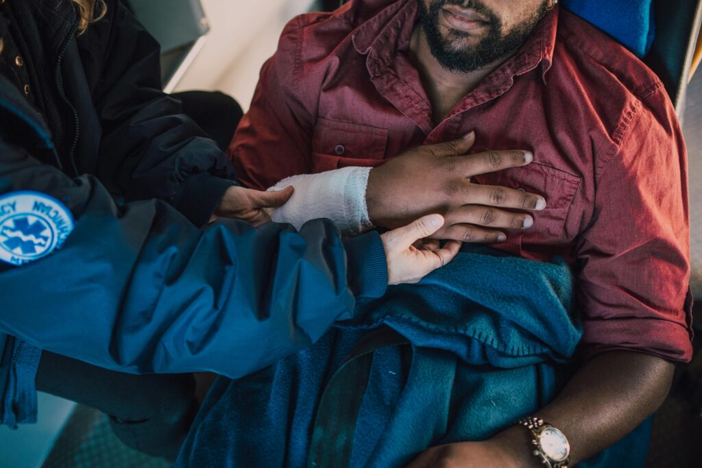 Man receiving medical care after an accident
