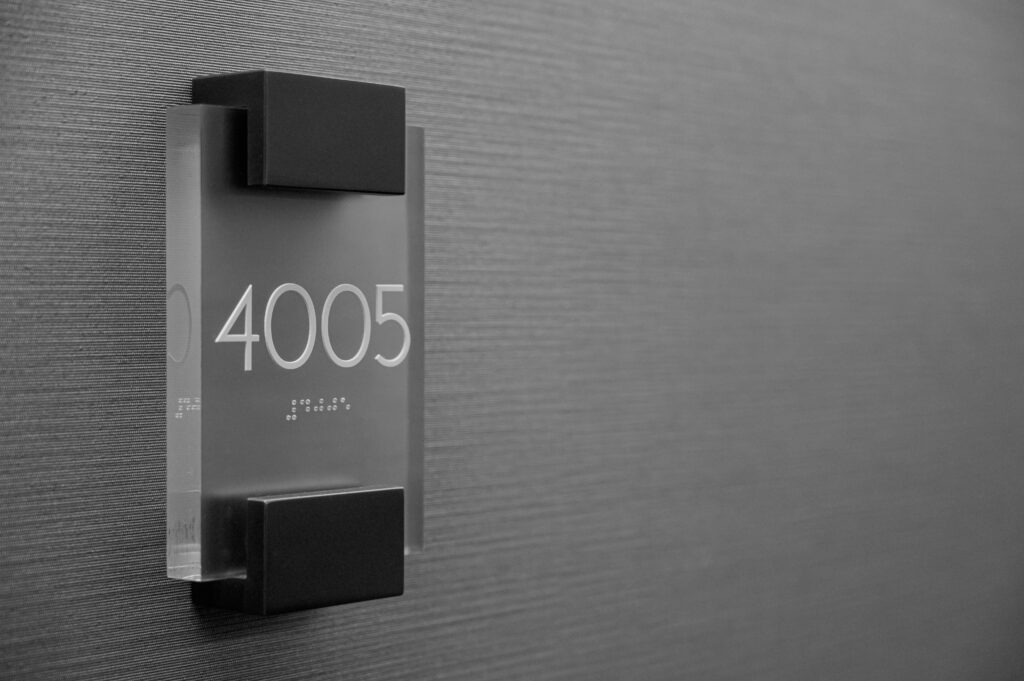 Numbered hotel door sign