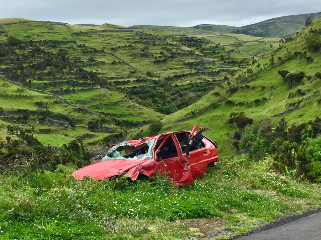 Crashed car in a field