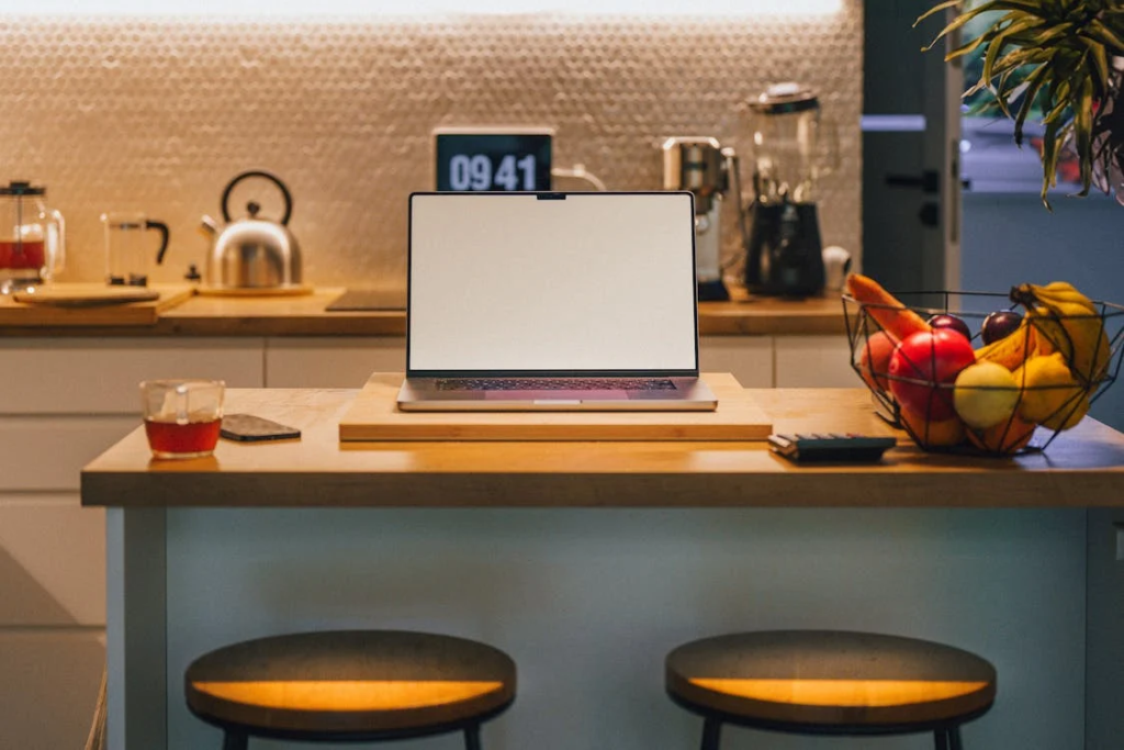 Laptop on a kitchen counter