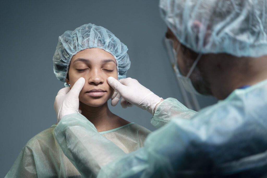 Patient getting checked by surgeon in hospital