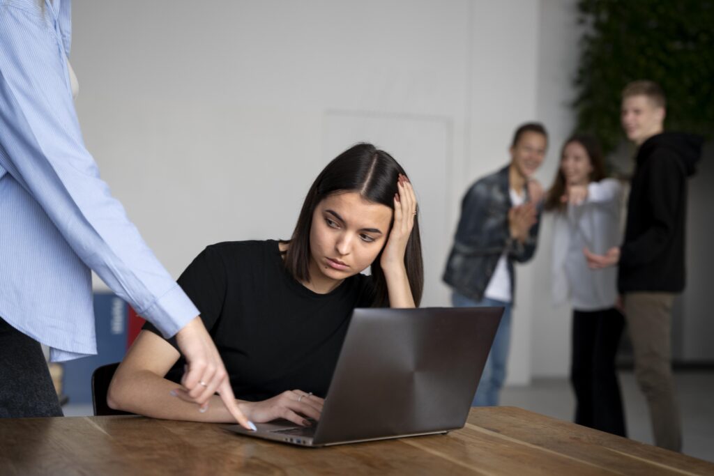 Female employee suffering from bullying