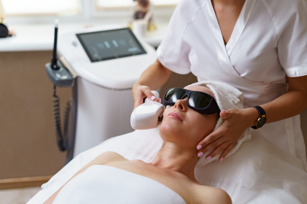 Woman getting BBL light therapy treatment