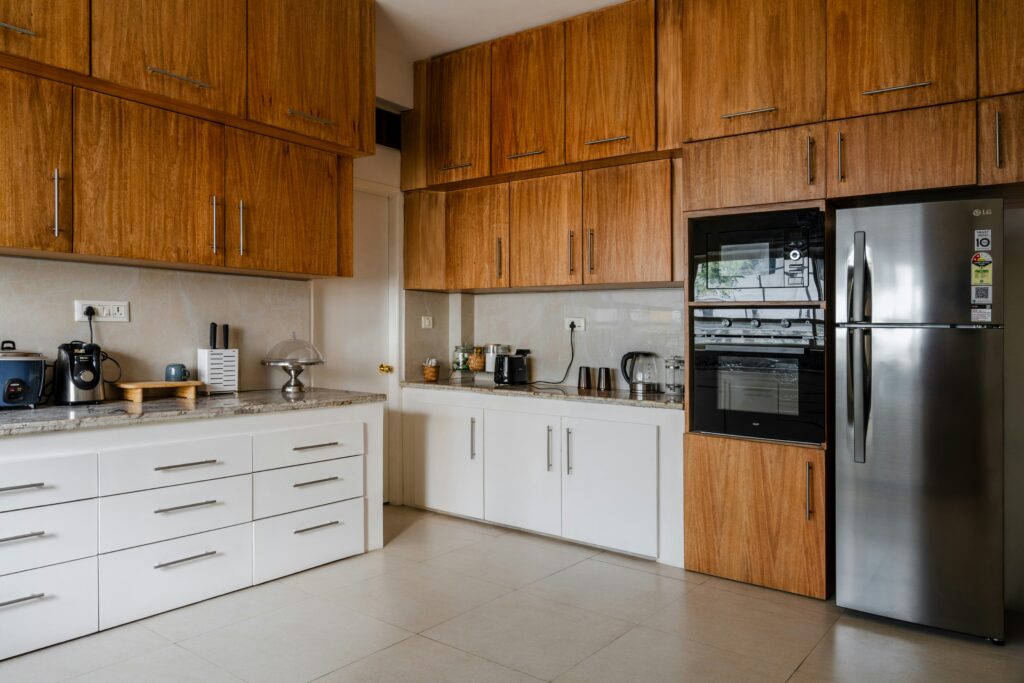 Wooden kitchen with built-in oven