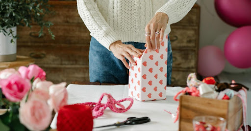 Anon woman wrapping gifts