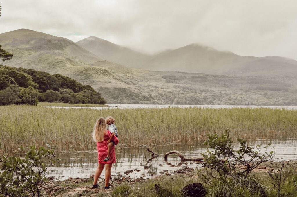 Mother holding a child in Killarney National Park