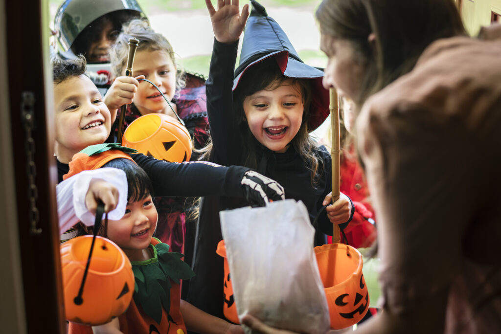Little children trick or treating