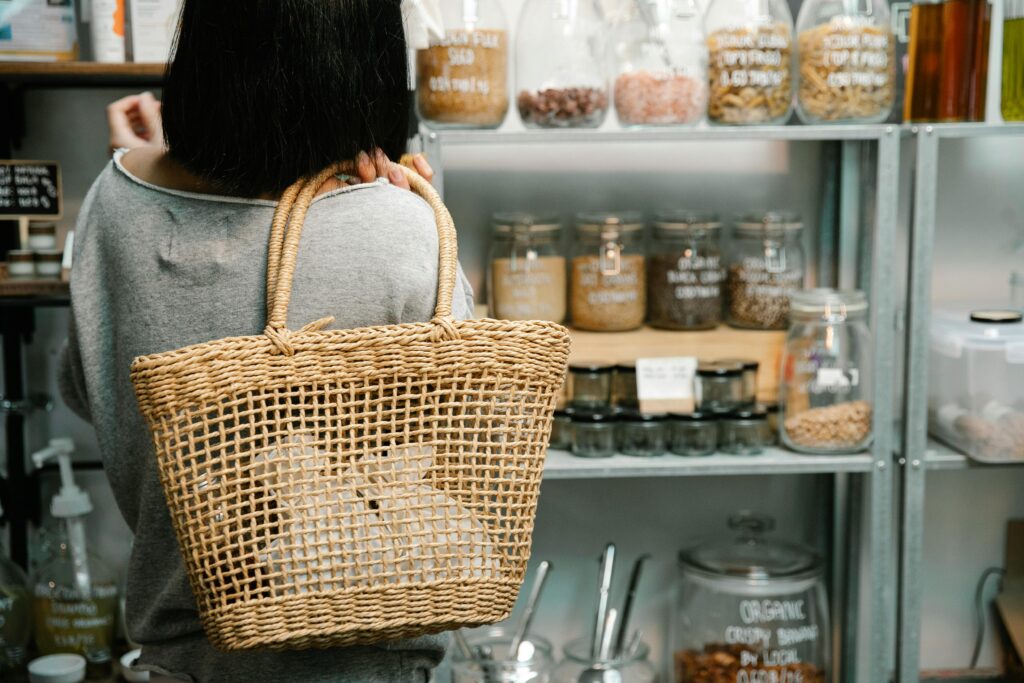 Woman with a wicker bag bulk buying produce