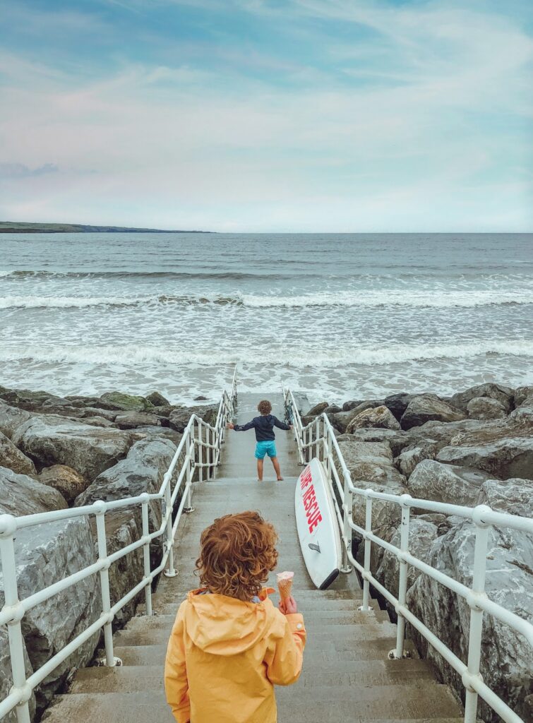 Kids on steps at the beach