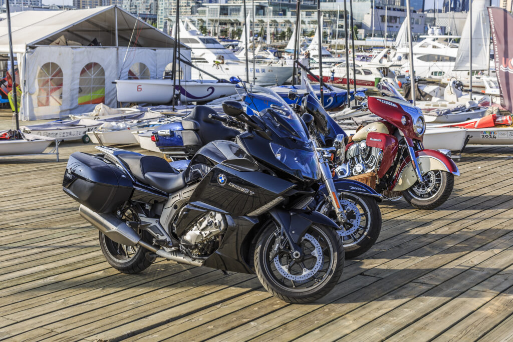 3 motorcycles on a pier