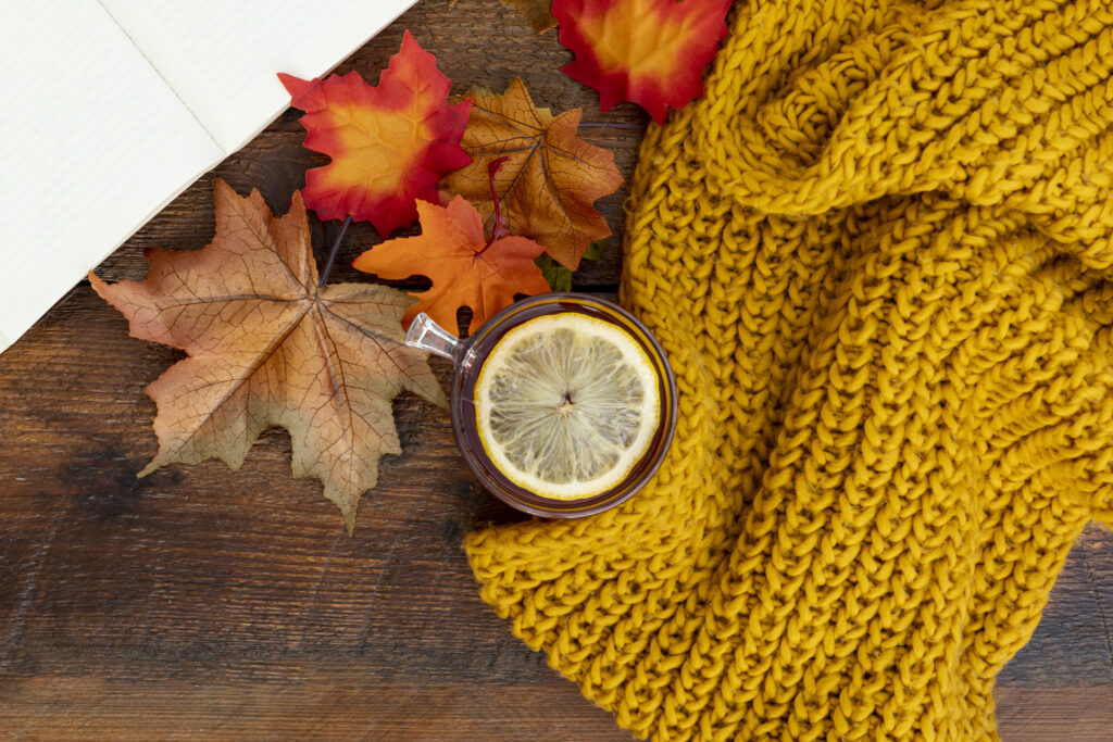 Seasonal autumn flat lay with mustard coloured knitwear