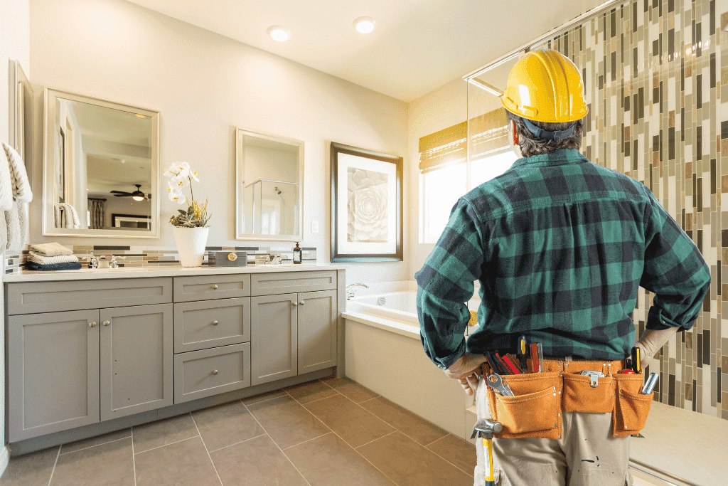Contractor looking at a bathroom