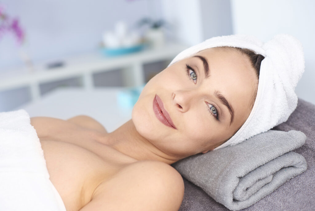 Beautiful woman relaxing in spa