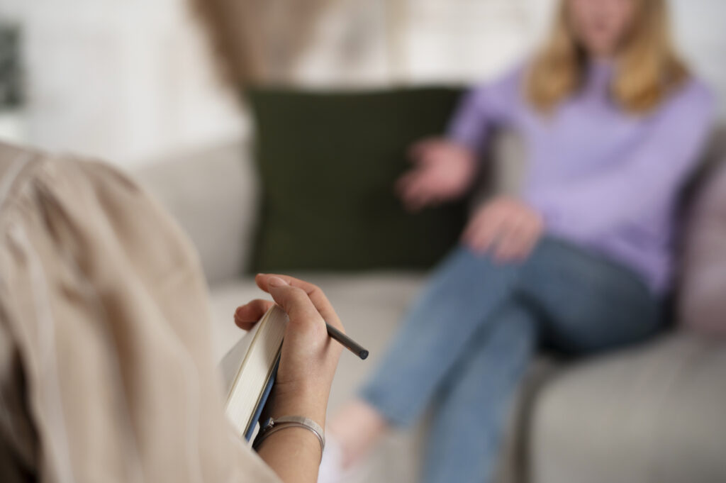Anon woman speaking with a therapist