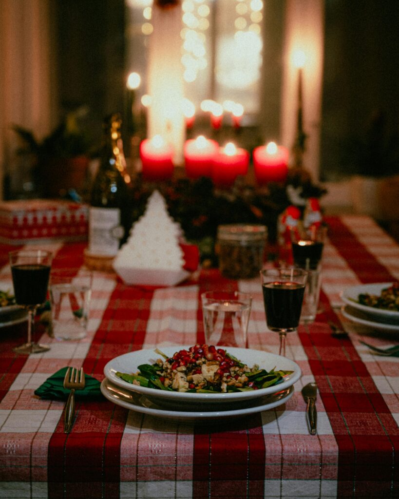 Red tablecloth at a candlit dinner table