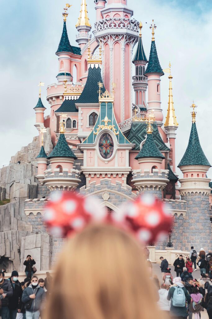 View of woman wearing Mickey ears at Disneyland