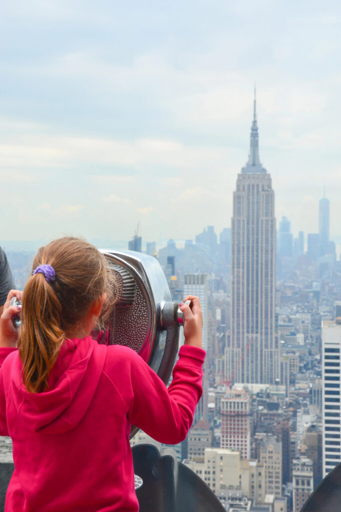 Girl looking at New York skyline