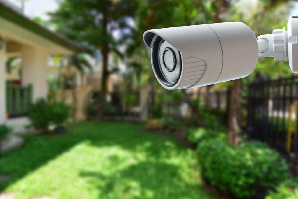 Security camera overlooking a backyard