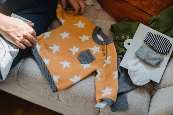 Mother packing child's clothes