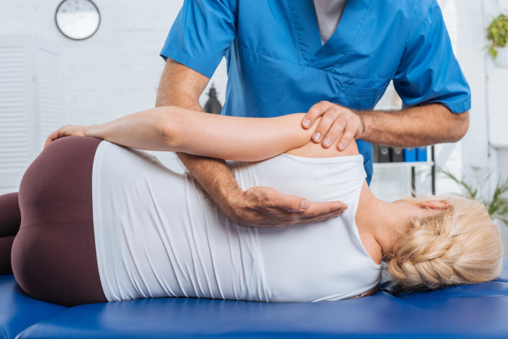 Chiropractor working on a patient's back